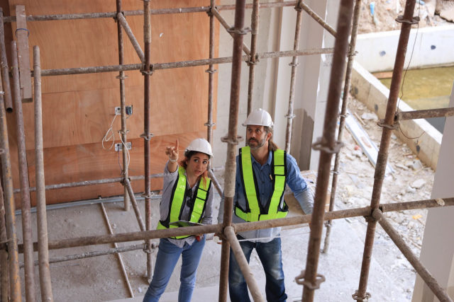 Professional scaffolding team on a construction site